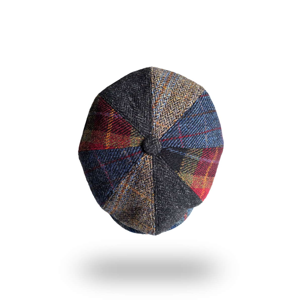 Patchwork tweed newsboy cap, top view showing eight panels and button